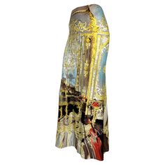 Presenting a fabulous baroque print Roberto Cavalli high-waisted maxi skirt. From the Spring/Summer 2003 collection, this skirt depicts a baroque-style room with musical instruments. Similar prints were featured in the season's runway presentation. The skirt features a flared cut and is the perfect Y2K Roberto Cavalli addition to any wardrobe! Approximate measurements: Size - Small Waistband to hem: 41" Waist: 27" - 32" Hips: 36" - 42" 90% polyamide, 10% elastane Luxury Fitted Gold Skirt, Elegant Printed Skirt, Roberto Cavalli 2003, Roberto Cavalli Skirt, Vintage Runway Fashion, Robert Cavalli, Roberto Dress, Glitter Skirt, Vintage Haute Couture