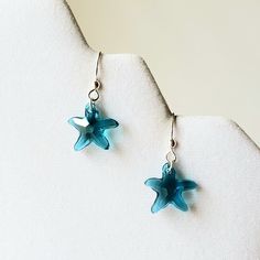 "- \"Beach Bedazzled\" is our 2 1/4\" dangling Earring beauty with the Beach in mind. - 925 Sterling Silver Shell pairs with 925 Sterling Silver Plated Starfish and several Swarovski Faceted Bicone Crystals in Turquoise anf Teal Blue shades. -Crystals are in a Teal Blue or Blue Zircon shade with Glass Seed Beads in Blue/Green and Capri Blue. We are talking serious Caribbean colors here! - 925 Sterling Silver Filled Bali Hook Ear Wires with Ball Ends. See Photos #1-4. - 925 Sterling Silver Posts Teal And Burgundy, Burgundy Shades, Turquoise And Teal, Petite Earrings, Deep Turquoise, Teal Earrings, Turquoise Blue Color, Blue Crystal Earrings, Sweet Earrings