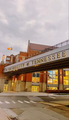 the university of tennessee building is lit up at night