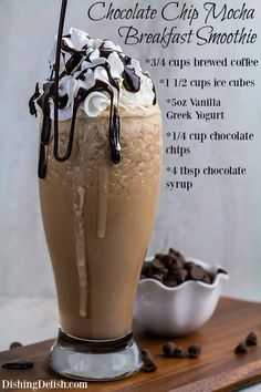 chocolate chip mocha breakfast smoothie with whipped cream and chocolate chips on the side