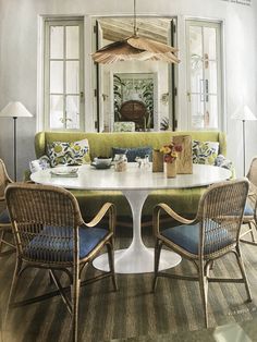 a dining room table with chairs around it