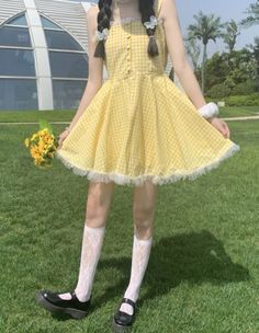 🌞 Step into Sunshine with Our Yellow Plaid Picnic Dress! 🌼👗 🌼 Cheerful and Chic: Our Yellow Plaid Picnic Dress is designed for those who appreciate the brightness of sunshine and want to radiate style effortlessly. Ideal for individuals who love to blend a touch of happiness with fashion. ✨ Superior Quality: Crafted with precision to ensure top-notch quality and style. This dress is designed to keep you looking both joyful and confident, whether you're out for a picnic or a casual outing. 💫 Cute A-line Sundress For Garden Party, Summer A-line Sundress For Picnic, Yellow Mini Dress For Spring Picnic, Cottagecore Ruffled Mini Dress For Summer, Cute Sleeveless Mini Dress For Picnic, Spring Gingham Sundress With Ruffles, Cute Yellow Dress For Garden Party, Cute A-line Mini Dress For Spring, Cute Spring Mini Dress For Picnic