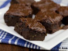 some brownies are on a white plate