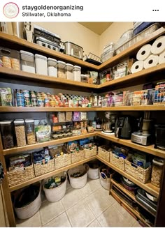 an organized pantry with lots of food in baskets and containers on the shelves, along with rolls of toilet paper