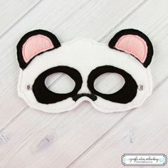 *Please read entire listing* These masks are great for Halloween, party favors, or just to pretend play around the house!!  *Mask Information* This listing is for 1 (one) Panda Bear Mask.  Comes with rivets attached, to make it a little more durable. Comes with round elastic cord cut to roughly 16-20 inches long, so you can cut the elastic to fit more comfortably on your child. Masks are roughly 5x7, depending on the design ordered. Please note: Most of the designs can fit a child up to 10. However, will vary between child and design.  Looking for adult sizes? Please personally contact me and ask if this design is available in adult size. Not all designs have that availability, but a lot haven't been listed yet. I'd love to help you out! Please supervise children who are using the masks. N Fun White Halloween Costume Accessories, White Themed Party Costumes, Fun White Costume Accessories For Halloween, Fun Costume Accessories For Costume Party, Themed Halloween Costume Party Supplies, Cute White Party Costumes, Cute Halloween Costume Accessories, Fun Halloween Masquerade Costume Accessories, Fun Costume Accessories For Birthday Carnival