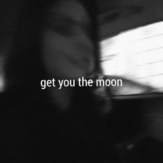 a woman with her eyes closed and the words'get you the moon'in front of her