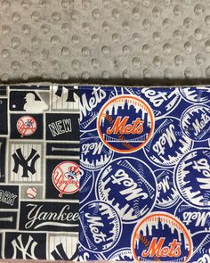 the new york mets logo is on this blue and white fabric with many other mlb logos