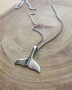 "Elegant stainless steel whale tail pendant. The beauty in details. Perfect gift for an ocean lover Pendant size : 1 inch  Chain length : 20 inch  Need a different length just write it to me in the \"message to the seller\" box of the order form. **LIMITED SUPPLY** All of our jewelry comes wrapped and ready for gift giving! To see more, please visit my shop at http://www.etsy.com/ca/shop/BadassjewelryToronto" Whale Tail Jewelry, Whale Tale, Dolphin Tale, Hand Carved Jewelry, Silversmithing Jewelry, Coin Art, Ocean Jewelry, Nautical Jewelry, Silver Signet Ring