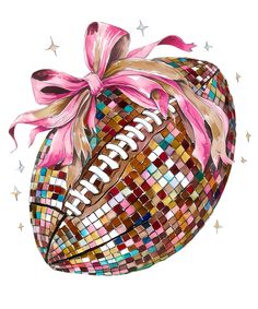 a football with a pink bow on it's head and the words happy new year