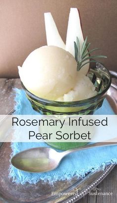 rosemary infused pear sorbet in a glass bowl with spoon and napkin on the side