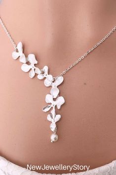 Orchid necklace Silver necklace Flower lariat necklace Wedding jewelry Bridesmaid gift for women Mothers day gift for mom Orchid flower #Orchid #necklace #Flower #lariat #Wedding #jewelry #Bridesmaid #NewJewelleryStory Flower Orchid, Orchid Necklace, Pearl Lariat Necklace, Pure Gold Jewellery, Silver Diamond Necklace, Wedding Bridesmaid Jewelry, Blue Topaz Necklace, Necklace Flower, Jewelry Bridesmaid