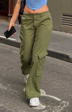 * Khaki Low Rise Cargo Pants 
 * These low rise khaki pants () are super cool and stylish! Grab sunnies () and a bag () for an off duty fit that you're sure to love. Be sure to pair with a cute crop () and gold jewellery () to complete this look!  
 * 
 
 * Elasticated waistline 
 * Zip closure on the front 
 * Unlined 
 * Full length 
 * Belt loops 
 * 6 pockets- 4 on the front, 2 on the back Light Cargo Pants, Low Rise Cargo Pants, Summer Playsuit, Crochet Sandals, Sweater Crop, Strapless Tops, Crop Top Sweater, One Shoulder Tops, Cargo Trousers