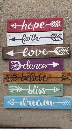 wooden signs that say hope, faith, love, dance, believe, and dream