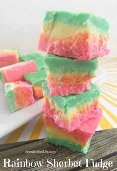 rainbow sherbet fudge bars stacked on top of each other