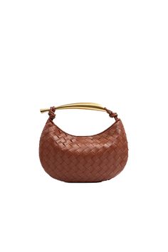 This Women’s Woven Dumpling Clutch Bag is perfect for everyday use. Made with genuine leather and featuring a spacious interior with a zippered pocket, this bag is both stylish and functional. The soft material and metal handle make it comfortable to carry, while the woven design adds a touch of elegance. Material: Genuine leather Style: Urban simplicity Size: Medium (29cm x 2cm x 18cm / 11.4″ x 0.8″ x 7.1″) Color options: Gold, Silver, Beige, Pink, White, Gray-Brown, Brown, Wine Red, Dark Brown, Dark Gray, Black Features: Woven design, metal handle, zippered pocket Suitable for: Daily use Brown Clutch, White Homecoming Dresses, Blue Homecoming Dresses, Black Features, Brown Brown, Red Dark, Woven Design, Leather Style, Wine Red