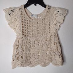 Elevate Your Wardrobe With This Brand New With Tags (Nwt) Zara Women’s Crochet Knit Crop Top In A Versatile Beige Color. This Top Is A Size Small And Features Intricate Crochet Detailing That Adds A Touch Of Elegance And Texture To Any Outfit. The Crop Top Design Is Perfect For Pairing With High-Waisted Bottoms For A Chic, Modern Look. Ideal For Adding A Bohemian Flair To Your Wardrobe, This Zara Crochet Top Is Sure To Become A Favorite Go-To Item. Don’t Miss Out On This Stylish And Versatile Pi Zara Open Knit Crochet Top For Spring, Zara Beige Knit Top For Summer, Zara Beige Crochet Top For Spring, Cream Crochet Knit Top For Summer, Cream Open Knit Top For Summer, Bohemian Cotton Crochet Top With Pointelle Knit, Casual Crochet Lace Dress, Casual Cotton Crochet Top By Zara, Zara Tops With Crochet Trim For Spring