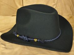 hat band, cowboy hat band concho, custom hat band, hat bands women, leather hat band, western hat band, concho hat band, hat bands, cowboy hat band men,  leather hat bands, hat bands for we, mens hat band, Are unique hat bands important in men's fashion? Yes, they are absolutely perfect fashion accessories for men. A unique handcrafted hat band can revive a dull outfit and light up your day. To get a stylish and elegant look, add this fashionable black leather band to your hat. Black matches eve Western Hat Bands For Country Concerts, Western Brimmed Hat Bands For Ranch, Country Style Hat Band With Flat Brim For Ranch, Western Black Hat Band For Western-themed Events, Adjustable Black Hat Bands For Riding, Rigid Flat Brim Hat Bands For Rodeo, Western Concho Hat Bands For Country Events, Western Black Hat Bands For Country Events, Western Style Black Hat Bands For Country Events