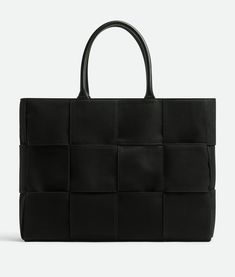 Bottega Veneta® Large Arco Tote Bag in Black. Shop online now. Business Tote Shoulder Bag With Intrecciato Weave, Business Intrecciato Weave Tote Shoulder Bag, Business Intrecciato Tote Shoulder Bag, Modern Bag With Intrecciato Weave And Double Handle, Business Bags With Braided Handles And Rectangular Shape, Black Workwear Bags With Braided Handles, Rectangular Intrecciato Weave Work Bag, Modern Woven Leather Bags For Work, Rectangular Work Bags With Braided Handles