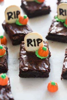 halloween brownies with tombstones and candies on them are ready to be eaten