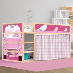 a child's bunk bed with pink and white furniture