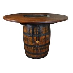 a wooden table with a wine barrel on top