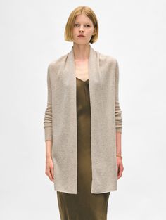 The longest-running piece at White + Warren, the Cashmere Trapeze Cardigan is a chic fingertip-length open sweater that works on every body type. No matter what color you choose, you'll want to wear this timeless style season after season. Details Straight fit. Long sleeve. Length in size small is 32.5" The model is 5'9" and is wearing a size small. 100% Cashmere Hand wash cold or dry clean. Do not twist or wring. Reshape and lay flat to dry. Warm iron if needed. Style #11092 Open Sweater, No Matter What, Timeless Style, You Choose, Body Types, Lay Flat, Timeless Fashion, Cashmere, Matter