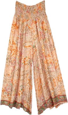 Abstract floral and paisley prints on wide-leg pants which are soft and flowy, and have a smocked waist.  The loose-fit wide-leg printed rayon pants have a comfortable waist that will fit a small to a large. #tlb #SplitSkirtsPants #beachwrap #Printed #bohemianfashion #festivalpants Printed Wide Leg Pants For Vacation, Summer Wide-leg Paisley Print Pants, Summer Floral Print Wide-leg Harem Pants, Summer Boho Print Wide-leg Harem Pants, Floral Print Wide Leg Harem Pants For Vacation, Flowy Casual Bottoms With Boho Print, Paisley Print Long Pants For Vacation, Summer Boho Print Wide-leg Pants, Flowy Boho Print Bottoms