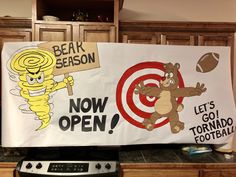 there is a sign that says bear berson now open let's go tornado football