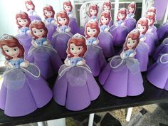 there are many princesses in purple paper bags