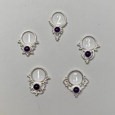 These are soooooo pretty. Made is 925 sterling silver with tribal details, set with a bright amethyst  stone. The rings are all 1cm (.40”) in diameter. The wire is 20 gauge.Stones shine light through them since the back is open. Hard to see this when they are lying flat in the pic. Each piece is made BY HANDOne of the images contains numbers to specify which you would like from the drop down menu. Spiritual Silver Body Jewelry For Gift, Pierced Sterling Silver Belly Rings, Silver Sterling Belly Rings, Spiritual Silver Amethyst Ring In Sterling Silver, Silver Internally Threaded Toe Ring, Silver Amethyst Stackable Jewelry, Sterling Silver Body Jewelry, Silver Stackable Amethyst Jewelry, Silver Amethyst Ring, Spiritual Birthstone