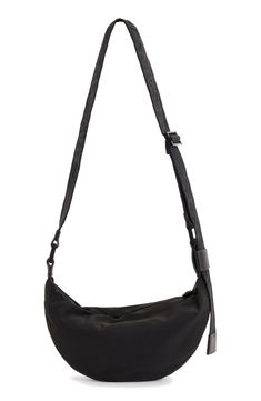 A half-moon silhouette lends visual intrigue to a spacious crossbody bag fashioned with a constrasting, adjustable strap. Cotton lining Textile with leather trim Imported Allsaints Crossbody Travel Shoulder Bag, Allsaints Crossbody Shoulder Bag For Travel, Allsaints Crossbody Shoulder Bag For Everyday Use, Allsaints Everyday Crossbody Shoulder Bag, Allsaints Crossbody Travel Bag, Allsaints Shoulder Bag With Adjustable Strap For Everyday, Allsaints Casual Shoulder Bag With Adjustable Strap, Black Allsaints Bag With Adjustable Strap, Allsaints Black Bags For Everyday Use