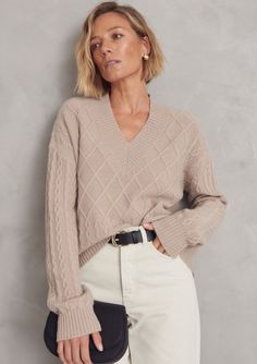 Soft and stylish this v neck sweater is crafted from 100% sustainable cashmere and has chunky ribbed trims and a mixed up all over cable design.  Knitted in super soft 100% sustainable cashmere. 100% sustainable cashmere Sustainable Clothing Brands, Stocking Fillers For Her, Office Dress, Tailored Trousers, Sustainable Clothing, Independent Designers Fashion, V Neck Sweater, Dressed Down, Vneck Sweater