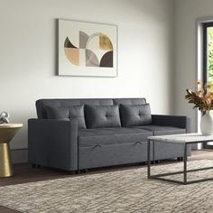 a living room scene with focus on the couch and coffee table