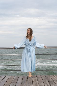 Blue Maxi Dress,Linen blue long dress,Puff sleeves dress,Maternity dress,Oversized dress,Linen Looose dress,Plus size dress Maxi linen  Dress Spring-summer dress with long  sleeves. Dress below the knee, flared. Round neckline with decorative pleats at the bodice. Long and wide sleeves gathered at the cuff. The dress fastens with buttons. Ties at the waist. Dress without lining.  Model height 170cm and S Sleeve length: 67cm  Product length from the shoulder: 94cm, 110cm , 130 cm.  - Made from 100% natural linen. Certified by OECO-TEX  -Details: The fabric is soft, as the product is pre-washed to avoid shrinkage in the future. - Care instructions: It is desirable to wash the product in cold water (not higher than 40 degrees), and also wash the product in a delicate mode. Please use mild det Blue Long Sleeve Puff Sleeve Dress For Brunch, Blue Dress With Lantern Sleeves And Gathered Details, Blue Bishop Sleeve Dress With Elastic Sleeves, Blue Puff Sleeve Dress With Pleated Sleeves, Daywear Dress With Smocked Cuffs And Balloon Sleeves, Blue Beach Dress With Gathered Sleeves, Balloon Sleeve Dress With Smocked Cuffs For Daywear, Blue Dresses With Gathered Sleeves For Beach, Blue Balloon Sleeve Dress For Brunch