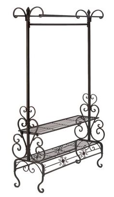 an iron rack with two shelves on each side and one shelf below it, against a white background