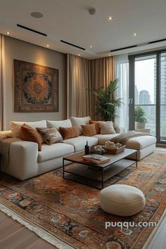 a living room filled with furniture and a large window covered in curtains next to a rug