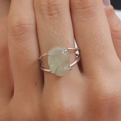 Prehnite Ring / 925 Sterling Silver Ring / Crystal Ring / Women Silver Ring / Cabochon Gemstone Jewelry / Anniversary Gift Gemstone Name - Prehnite  Stone Quality - AAA Ring Wight - 3.8 gm  Ring Length - 1.4 cm  Ring Width - 1 cm  Stone Shape - as shown in the picture Ring Size - All Ring Size Available You'll get the exact product as shown in the pictures We serve complete 925 sterling silver Jewelry and genuine properties of the stone. The products are dispatched from the small business from USA. Product Quality and Packaging - Our all products are 925 Silver Stamped which shows that the product is genuine and authentic .The products are dispatched from the small business from USA so you get the product on time and the product packaging comes in bubble foil wrap with all the precautions Prehnite Ring, Picture Ring, Ring Crystal, Crystal Ring, Ring Women, Crystal Rings, Product Packaging, 925 Sterling Silver Jewelry, Rings Statement