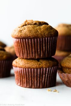 several muffins stacked on top of each other with one muffin in the middle