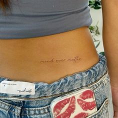 a woman's stomach with the word meand ever after written on her belly