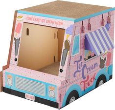 a cardboard ice cream truck is shown with the door open