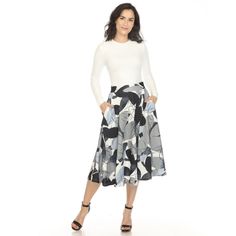 Indulge in timeless elegance with our Women's Leaf Print Vintage Flared Midi Skirt. Crafted with meticulous attention to detail, this skirt seamlessly combines style and functionality. The charming leaf print adds a touch of vintage flair, ensuring you stand out with every step. White A-line Skirt For Fall, White Fitted Maxi Skirt For Fall, White Fitted A-line Bottoms, White Flared Maxi Skirt For Work, White Full Skirt For Fall, White Flared Maxi Skirt For Fall, White A-line Fitted Bottoms, White Lined Maxi Skirt For Fall, White Fitted Midi Length Bottoms