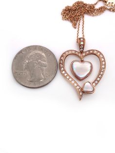 Gorgeous Love gift all-natural diamond and pink mother of pearl set in 18k solid rose gold heart pendant and linked chain necklace. Total weight: 7.8 grams Heart pendant size: 34*24 mm Chain length: 18 inches Total diamond weight: 0.46 tcw (stamped) Clarity: VS2 Color: G It comes in a nice gift box! Luxury Rose Gold Double Heart Jewelry, Luxury Rose Gold Heart Necklace For Anniversary, Luxury Rose Gold Heart Necklace, Elegant Mother Of Pearl Jewelry For Valentine's Day, Gold Bar Pendant, Gold Heart Pendant, Map Pendant, Pearl Heart, Heart Pendant Gold