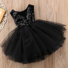 A Favorite Among Little Girls, She’ll Feel Like A Little Princess In This Dress. Perfect For That Special Occasion: Birthday, Flower Girl, Daddy/Daughter Dance, Etc. Black Sequin Bodice Has Open Back With Button Top And Stretch. Skirt Is Black Tulle With A Cotton Lining And Satin Tie In Back. *Back Or Dress Shown In Pink/Gold Style Girls Tulle Dress, A Little Princess, Birthday Flower, Stretch Skirt, Black Tulle, Dress Girls, Button Top, Black Sequins, Tulle Dress