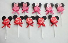 mickey mouse lollipops with pink bows and ears