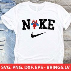 a white shirt with the words nike and spiderman on it, next to ripped jeans