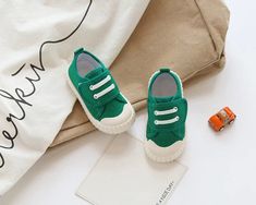 Vibrant Kids Canvas Shoes - Momorii Playful Green Sneakers With Rubber Sole, Cute Canvas Low-top Sneakers, Trendy Green Canvas Shoes With Rubber Sole, Cute Low-top Canvas Sneakers, Green Non-slip Sneakers For Summer, Playful Spring Sneakers For Playtime, Cute Low-top Canvas Shoes, Trendy Green Low-top Canvas Shoes, Spring Canvas Shoes With Rubber Sole For School