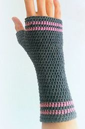 a woman's hand wearing a gray and pink arm warmer