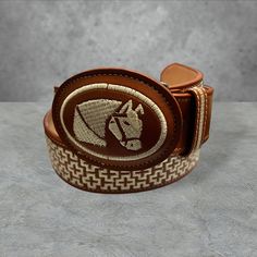 please message us when ordering to choose round buckle or square buckle high quality leather embroidered belt These belts compliment cowboy/cowgirl buckles perfectly all belts come with slightly different patterns Interchangeable buckle  Made in Mexico We recommend going one size up from jean size EX: if you are a 34 in jeans we would recommend a size 36 in belt Please measure to ensure you are selecting correct size all sales final Traditional Brown Belt Buckles With Matching Belt, Traditional Brown Belt Buckle With Belt Included, Western Embroidered Belt For Western-themed Events, Brown Hand Tooled Belt Buckles For Rodeo, Western Style Brown Belt For Rodeo, Western Brown Belt For Western-themed Events, Western Style Brown Belt For Western-themed Events, Hand Tooled Brown Belt Buckles For Rodeo, Brown Western Belt For Western-themed Events