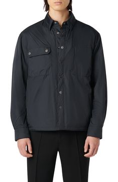 Water-resistant nylon brings durability to this relaxed shirt-jacket that boasts both side-seam and chest snap-flap patch pockets. 25" length Front snap closure Spread collar Chest snap-flap patch pockets; side-seam pockets Partially lined Water-resistant 100% nylon Dry clean Imported Black Utility Jacket With Button Closure For Outdoor, Outdoor Button-up Shacket With Flap Pockets, Outdoor Snap Button Shacket, Casual Nylon Outerwear With Button Closure, Outdoor Nylon Outerwear With Button Closure, Nylon Outerwear With Button Closure For Outdoor, Button-up Outdoor Outerwear With Flap Pockets, Outdoor Button-up Outerwear With Flap Pockets, Outdoor Button-up Outerwear With Snap Buttons