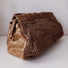 Miu Miu Prada Vintage Camel Brown Calfskin Wrinkled Leather Clutch Bag Used In Excellent Condition. 13" Long 7" High 4" Deep Miu Miu Brown Bag, Elegant Brown Miu Miu Bag, Miu Miu Formal Shoulder Bag With Gold-tone Hardware, Miu Miu Brown Bag With Gold-tone Hardware, Miu Miu Bags With Gold-tone Hardware, Miu Miu Bag, Patent Leather Handbags, Leather Clutch Bags, Leather Clutch